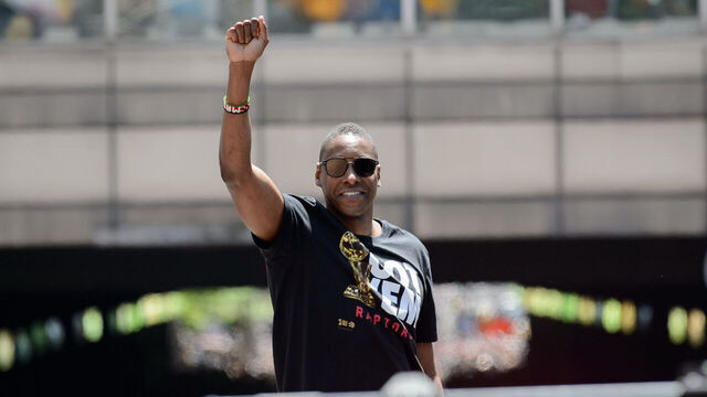TORONTO, ON - JUNE 17: Toroto Raptors president Masai Ujiri holds his fist in the air during the Toronto Raptors Championship parade on June 13, 2019 in Toronto, ON, Canada.