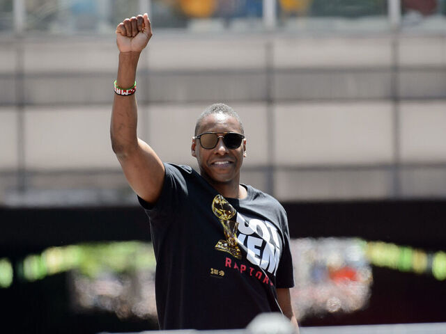 TORONTO, ON - JUNE 17: Toroto Raptors president Masai Ujiri holds his fist in the air during the Toronto Raptors Championship parade on June 13, 2019 in Toronto, ON, Canada.