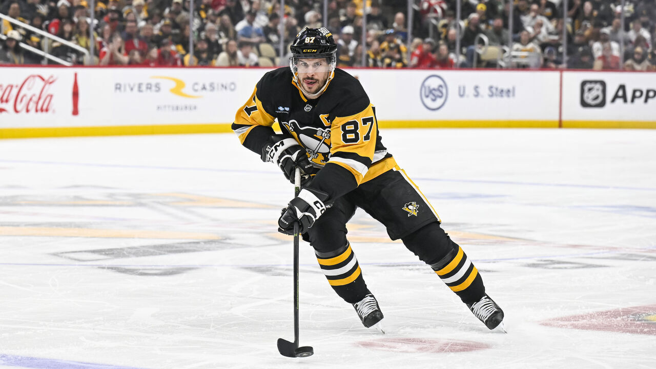 PITTSBURGH, PA - APRIL 17: Pittsburgh Penguins center Sidney Crosby (87) skates with the puck during the second period in the NHL game between the Pittsburgh Penguins and the Washington Capitals on April 17, 2025, at PPG Paints Arena in Pittsburgh, PA.