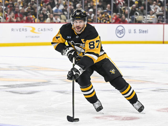 PITTSBURGH, PA - APRIL 17: Pittsburgh Penguins center Sidney Crosby (87) skates with the puck during the second period in the NHL game between the Pittsburgh Penguins and the Washington Capitals on April 17, 2025, at PPG Paints Arena in Pittsburgh, PA.