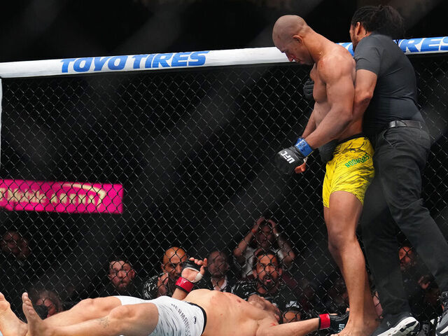 LAS VEGAS, NEVADA - JUNE 28: (R-L) Gregory Rodrigues of Brazil reacts to his knockout of Jack Hermansson of Sweden in a middleweight bout during the UFC 317 event at T-Mobile Arena on June 28, 2025 in Las Vegas, Nevada.