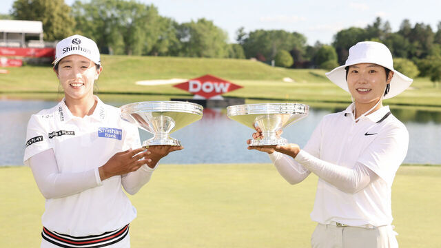 MIDLAND, MICHIGAN - JUNE 29: Jin Hee Im and Somi Lee of South Korea pose with their trophies after the final round of the Dow Championship 2025 at Midland Country Club on June 29, 2025 in Midland, Michigan.