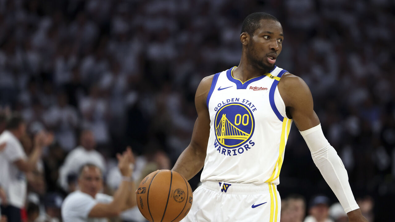 MINNEAPOLIS, MINNESOTA - MAY 14: Jonathan Kuminga #00 of the Golden State Warriors handles the ball during the first quarter of Game Five of the Western Conference Second Round NBA Playoffs against the Minnesota Timberwolves at Target Center on May 14, 2025 in Minneapolis, Minnesota.