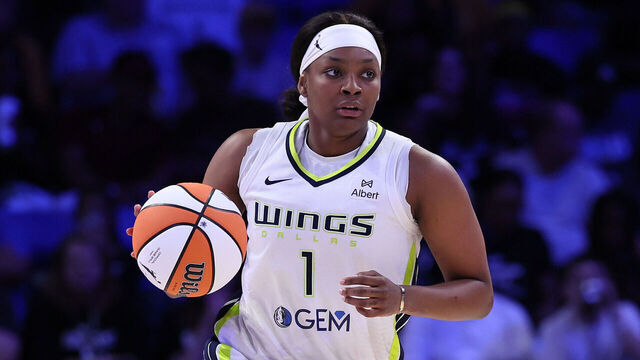 ARLINGTON, TEXAS - JUNE 24: NaLyssa Smith #1 of the Dallas Wings controls the ball during the first half against the Atlanta Dream at College Park Center on June 24, 2025 in Arlington, Texas.
