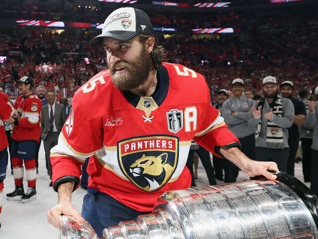 SUNRISE, FLORIDA - JUNE 17: Aaron Ekblad #5 of the Florida Panthers skates with the Stanley Cup following their win over the Edmonton Oilers following Game Six of the 2025 NHL Stanley Cup Final at Amerant Bank Arena on June 17, 2025 in Sunrise, Florida.