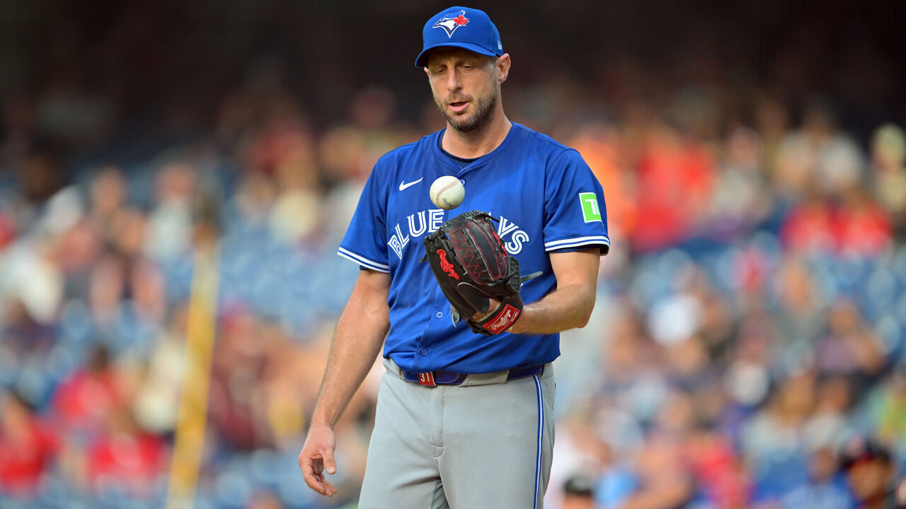 CLEVELAND, OHIO - JUNE 25: Starting pitcher Max Scherzer # 31 of the Toronto Blue Jays tosses the ball with his glove during the first inning against the Cleveland Guardians at Progressive Field on June 25, 2025 in Cleveland, Ohio.