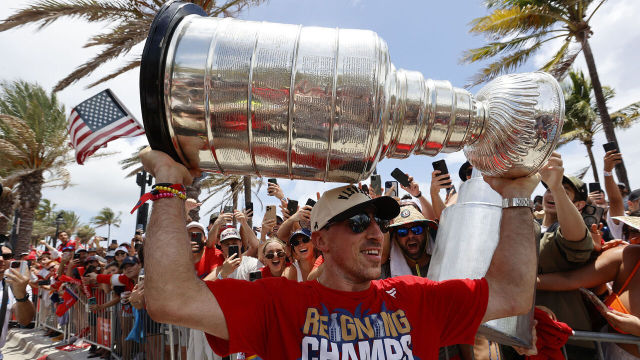 FORT LAUDERDALE, FLORIDA - JUNE 22: Brad Marchand #63 of the Florida Panthers holds the Stanley Cup during the Florida Panthers 2025 Stanley Cup Victory Parade and Rally on June 22, 2025 on Fort Lauderdale Beach, Florida.