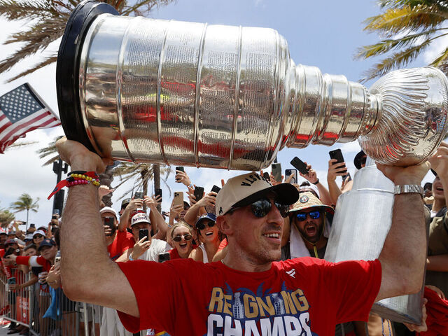 FORT LAUDERDALE, FLORIDA - JUNE 22: Brad Marchand #63 of the Florida Panthers holds the Stanley Cup during the Florida Panthers 2025 Stanley Cup Victory Parade and Rally on June 22, 2025 on Fort Lauderdale Beach, Florida.