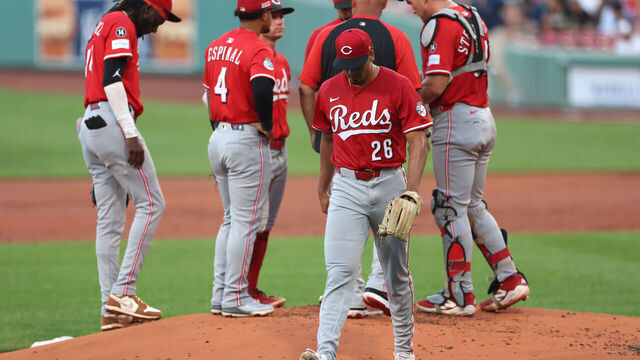 BOSTON, MASSACHUSETTS - JUNE 30: Chase Burns #26 of the Cincinnati Reds is taken out of the game during the first inning against the Boston Red Sox at Fenway Park on June 30, 2025 in Boston, Massachusetts.