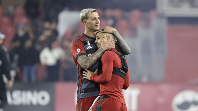 TORONTO, ON - August 30 In second half action, Federico Bernardeschi (10) of Toronto FC on the left and Lorenzo Insigne share a hug at the end of the match. Toronto FC beat the Philadelphia Union 3-1 in MLS soccer action at BMO field. August 30 2023 (Richard Lautens/Toronto Star via Getty Images)