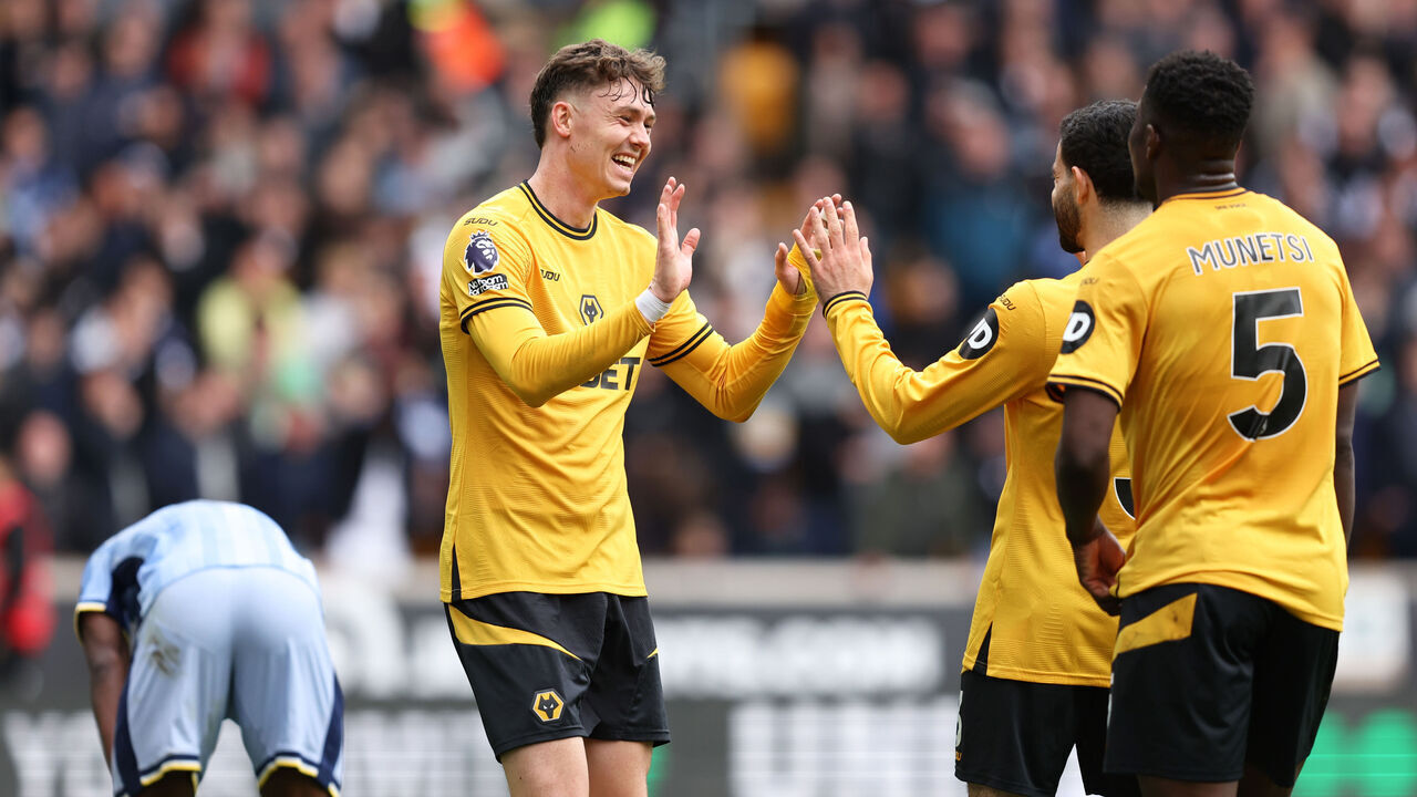 WOLVERHAMPTON, ENGLAND - APRIL 13: Jorgen Strand Larsen of Wolverhampton Wanderers celebrates with teammates during the Premier League match between Wolverhampton Wanderers FC and Tottenham Hotspur FC at Molineux on April 13, 2025 in Wolverhampton, England.