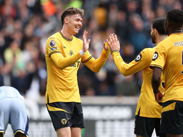 WOLVERHAMPTON, ENGLAND - APRIL 13: Jorgen Strand Larsen of Wolverhampton Wanderers celebrates with teammates during the Premier League match between Wolverhampton Wanderers FC and Tottenham Hotspur FC at Molineux on April 13, 2025 in Wolverhampton, England.