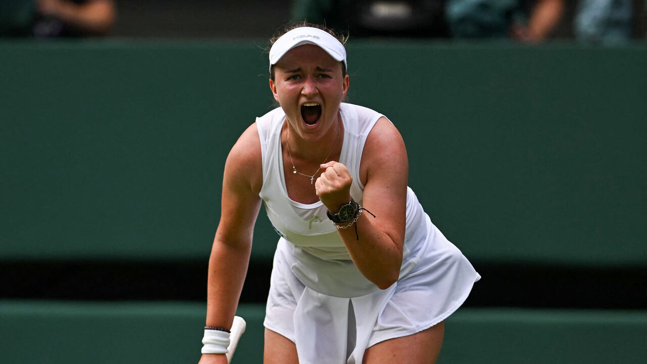 Czech Republic's Barbora Krejcikova celebrates winning against Philippines' Alexandra Eala their women's singles first round tennis match on the second day of the 2025 Wimbledon Championships at The All England Lawn Tennis and Croquet Club in Wimbledon, southwest London, on July 1, 2025.