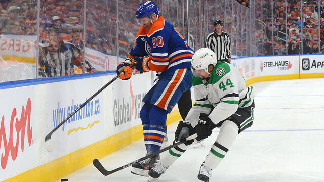 EDMONTON, CANADA - MAY 25: Corey Perry #90 of the Edmonton Oilers battles for the puck against Cody Ceci #44 of the Dallas Stars during the third period of Game Three of the Western Conference Finals of the 2025 Stanley Cup Playoffs at Rogers Place on May 25, 2025, in Edmonton, Alberta, Canada.