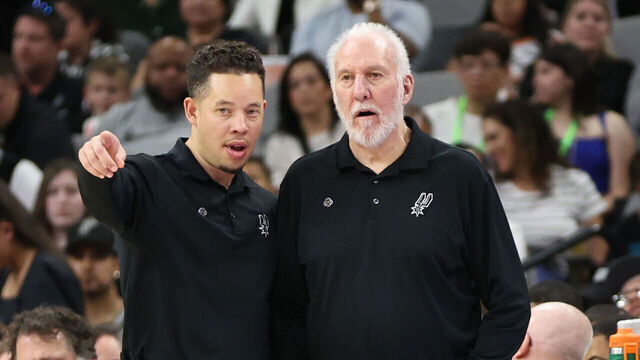 SAN ANTONIO, TX - APRIL 7: Assistant Coach Mitch Johnson and Head Coach Gregg Popovich of the San Antonio Spurs talk during the game against the Philadelphia 76ers on April 7, 2024 at the Frost Bank Center in San Antonio, Texas. Mandatory Copyright Notice: Copyright 2024 NBAE (Photos by Tim Heitman/NBAE via Getty Images)