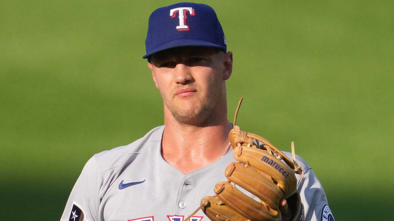 BALTIMORE, MD - JUNE 24: Josh Jung #6 of the Texas Rangers warms up before a baseball game against the Baltimore Orioles at Oriole Park at Camden Yards on June 24, 2025 in Baltimore, Maryland.
