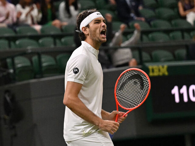 US player Taylor Fritz reacts as he plays against Canada's Gabriel Diallo during their men's singles second round tennis match on the third day of the 2025 Wimbledon Championships at The All England Lawn Tennis and Croquet Club in Wimbledon, southwest London, on July 2, 2025.