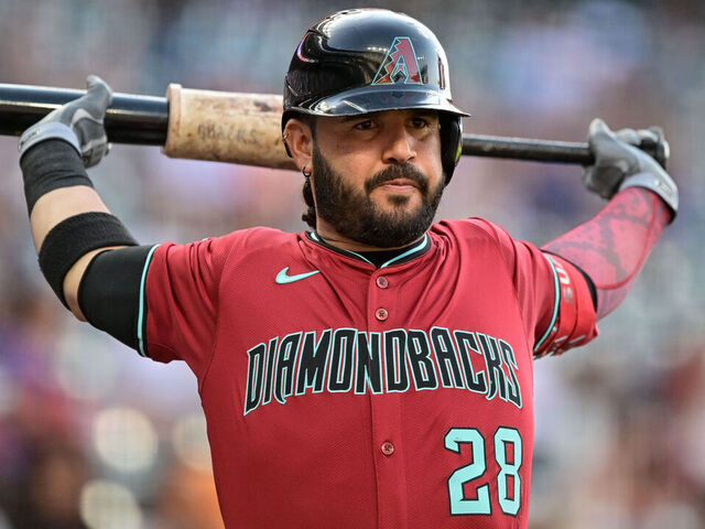 DENVER, CO - JUNE 20: Arizona Diamondbacks third baseman Eugenio Suarez (28) warms up before batting in the first inning during a game between the Arizona Diamondbacks and the Colorado Rockies at Coors Field on June 20, 2025 in Denver, Colorado.