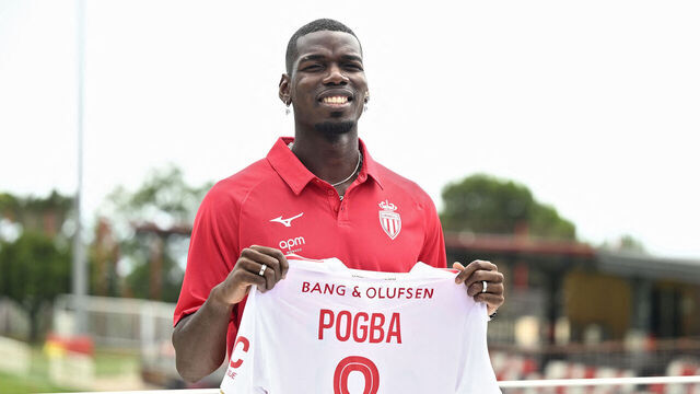 French midfielder Paul Pogba poses with his new jersey following his official presentation in Monaco, on July 3, 2025. Paul Pogba has signed a two-year deal with Ligue 1 side Monaco to return to football after a near two-year absence, the club announced on Juner 28, 2025.