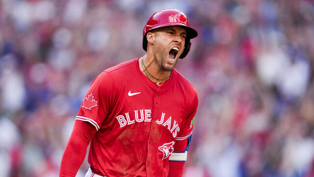 TORONTO, ON - JULY 1: George Springer #4 of the Toronto Blue Jays celerbates a grand slam home run against the New York Yankees in the seventh inning in their MLB game at Rogers Centre on July 1, 2025 in Toronto, Ontario, Canada.
