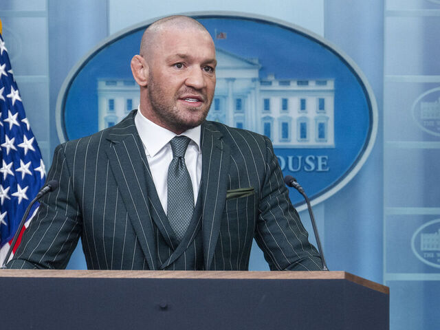 Irish professional mixed martial artist and businessman Conor McGregor (L) speaks from the White House briefing room podium with White House Press Secretary Karoline Leavitt (R) in Washington, DC, on March 17, 2025.