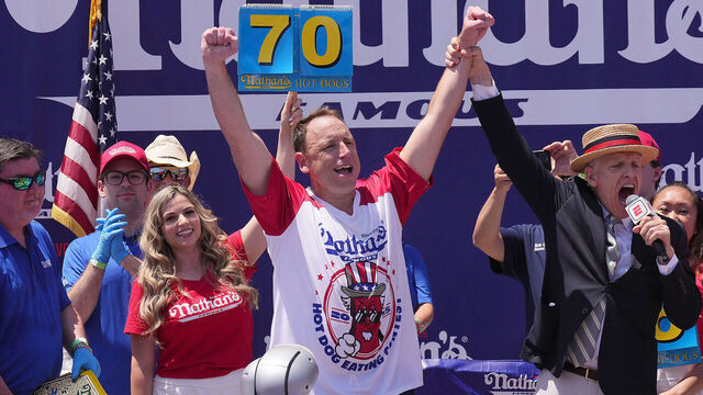 NEW YORK, NEW YORK - JULY 4: Joey Chestnut wins the men's competition at Nathan's Annual Hot Dog Eating Contest on July 4, 2025 in New York City. Joey Chestnut makes his return to the Nathan's Famous 4th of July Hot Dog Eating Contest to compete for a 17th win after missing the 2024 event due to a sponsorship dispute with Major League Eating.