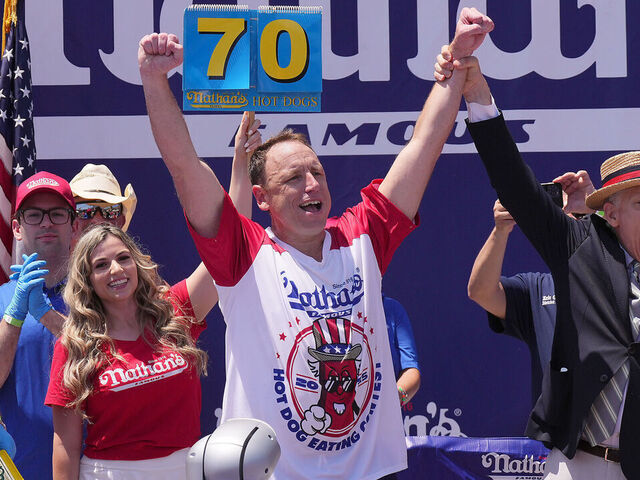 NEW YORK, NEW YORK - JULY 4: Joey Chestnut wins the men's competition at Nathan's Annual Hot Dog Eating Contest on July 4, 2025 in New York City. Joey Chestnut makes his return to the Nathan's Famous 4th of July Hot Dog Eating Contest to compete for a 17th win after missing the 2024 event due to a sponsorship dispute with Major League Eating.