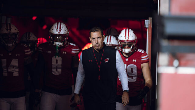 Wisconsin Badgers Head Coach Luke Fickell leads Wisconsin out of the tunnel at Camp Randall Stadium as they take on the Oregon Ducks in Madison, Wisconsin, on November 16, 2024.