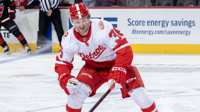 DETROIT, MICHIGAN - MARCH 04: Christian Fischer #36 of the Detroit Red Wings follows the play against the Carolina Hurricanes during the first period at Little Caesars Arena on March 4, 2025 in Detroit, Michigan. Carolina defeated Detroit 2-1.
