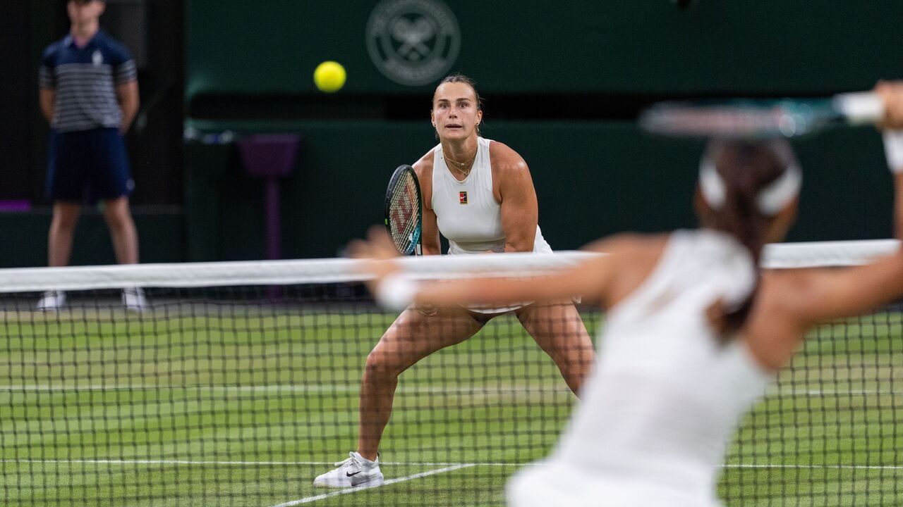 LONDON, UNITED KINGDOM - JULY 4: Emma Raducanu of Great Britain, Aryna Sabalenka of Belarus during Day Five of The Championships Wimbledon 2025 at All England Lawn Tennis and Croquet Club on July 4, 2025 in London, United Kingdom.