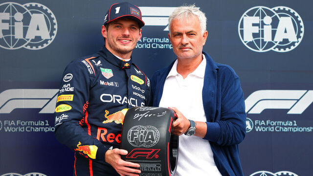 NORTHAMPTON, ENGLAND - JULY 05: Pole position qualifier Max Verstappen of the Netherlands and Oracle Red Bull Racing receives his Pirelli Pole Position Award from Jose Mourinho during qualifying ahead of the F1 Grand Prix of Great Britain at Silverstone Circuit on July 05, 2025 in Northampton, England.