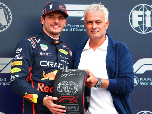 NORTHAMPTON, ENGLAND - JULY 05: Pole position qualifier Max Verstappen of the Netherlands and Oracle Red Bull Racing receives his Pirelli Pole Position Award from Jose Mourinho during qualifying ahead of the F1 Grand Prix of Great Britain at Silverstone Circuit on July 05, 2025 in Northampton, England.