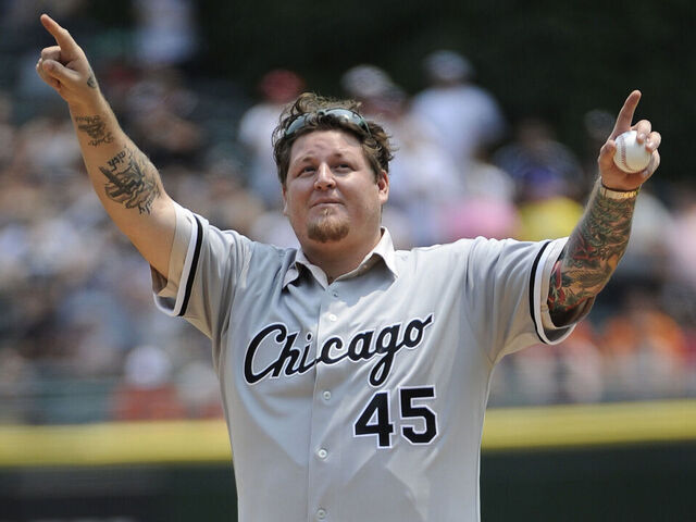 CHICAGO, IL - JULY 04: Former Chicago White Sox Bobby Jenks throws out the ceremonial first pitch before the game between the Chicago White Sox and the Baltimore Orioles on July 4, 2015 at U. S. Cellular Field in Chicago, Illinois.