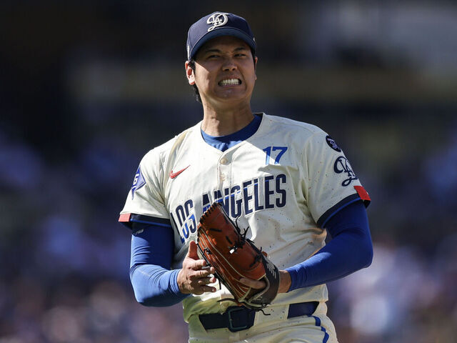 LOS ANGELES, CALIFORNIA - JULY 05: Shohei Ohtani #17 of the Los Angeles Dodgers reacts while pitching in the second inning against the Houston Astros at Dodger Stadium on July 05, 2025 in Los Angeles, California.