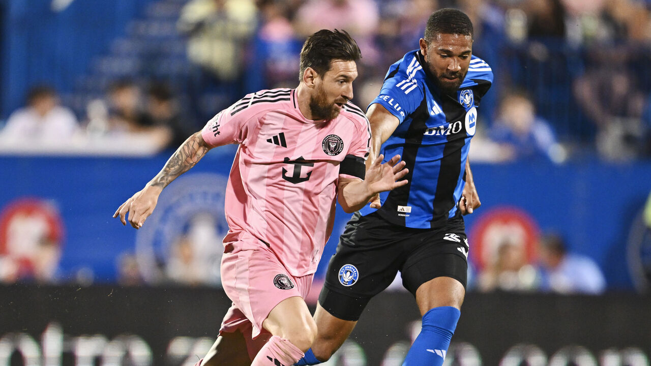 MONTREAL, QUEBEC - JULY 05: Lionel Messi #10 of Inter Miami CF is challenged by George Campbell #24 of CF Montréal during the MLS match between CF Montreal and Inter Miami CF at Saputo Stadium on July 05, 2025 in Montreal, Quebec.