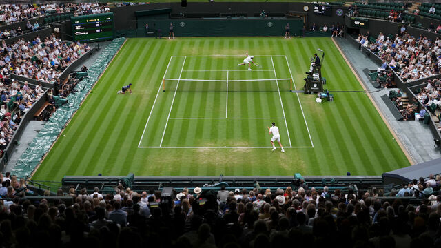 Spectators view the Gentlemen's Singles match between Jordan Thompson (top) and Taylor Fritz on day seven of the 2025 Wimbledon Championships at the All England Lawn Tennis and Croquet Club, London. Picture date: Sunday July 6, 2025.