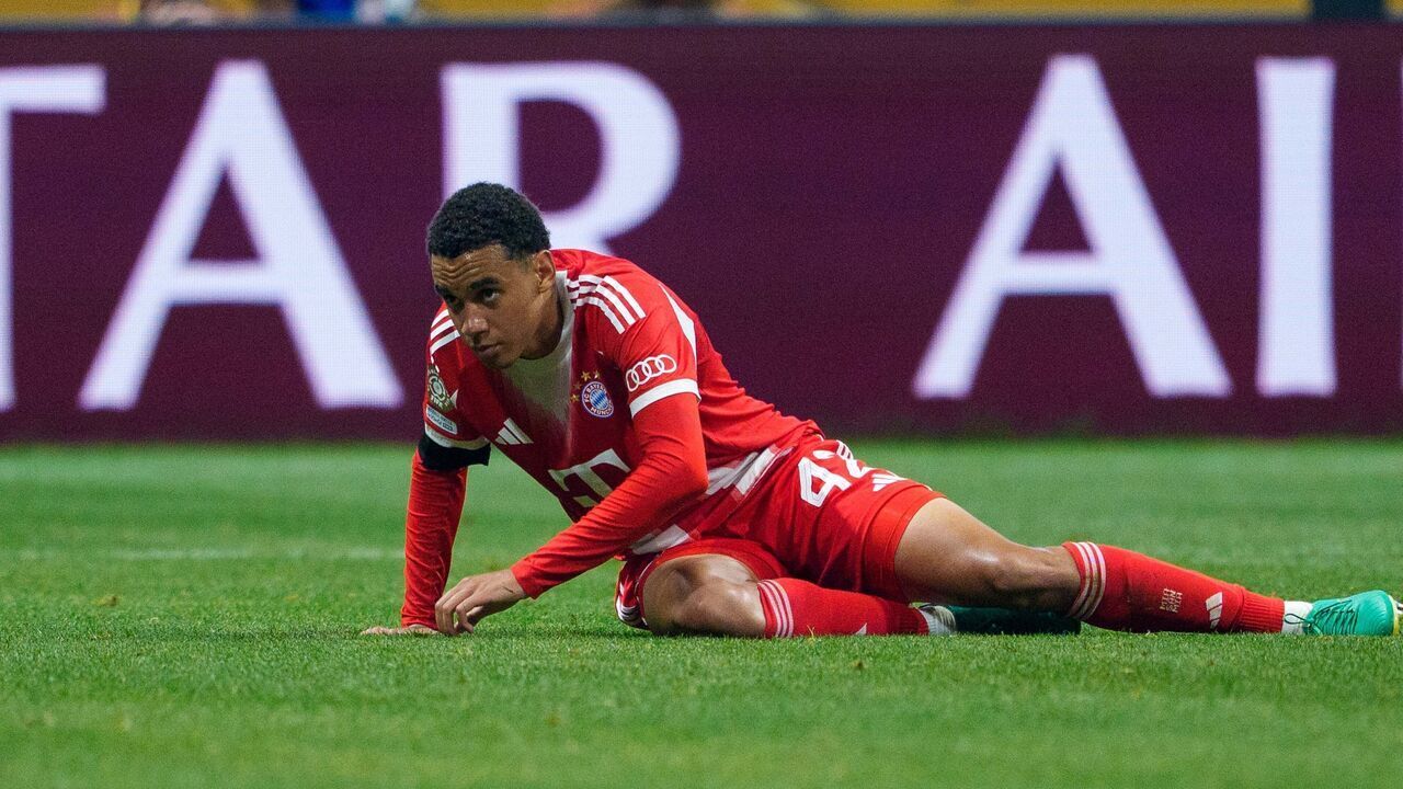 ATLANTA, GEORGIA - JULY 05: Jamal Musiala #42 of FC Bayern Munich lays on the ground during the FIFA Club World Cup 2025 quarter final match between Paris Saint-Germain and FC Bayern Munich at Mercedes-Benz Stadium on July 5, 2025 in Atlanta, Georgia.