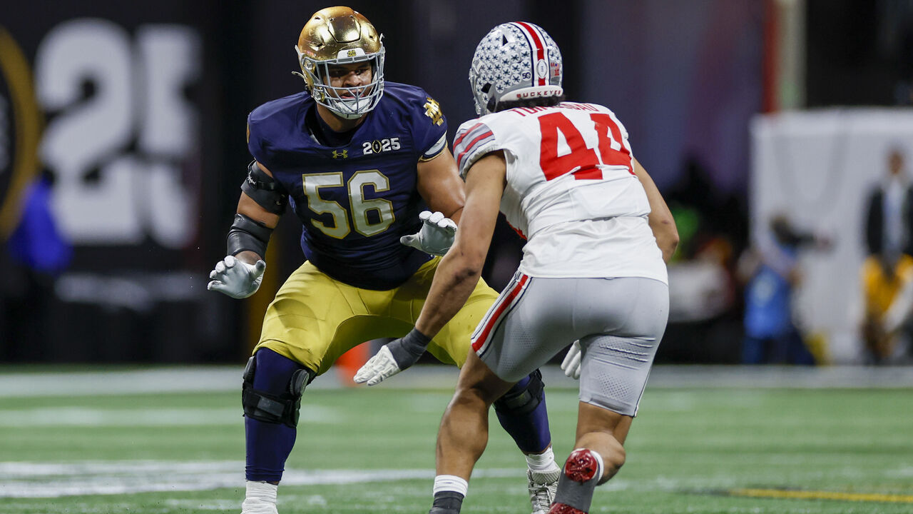 ATLANTA, GA - JANUARY 20: Offensive Lineman Charles Jagusah #56 of the Notre Dame Fighting Irish blocks during the Ohio State Buckeyes versus Notre Dame Fighting Irish College Football Playoff National Championship game on January 20, 2025, at Mercedes-Benz Stadium in Atlanta, GA.