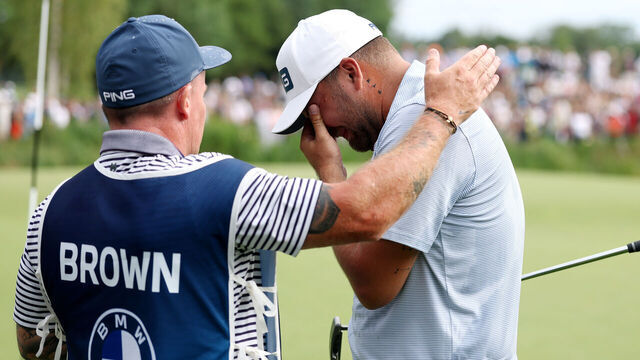 MUNICH, GERMANY - JULY 06: Daniel Brown of England celebrates victory of the BMW International Open on the 18th green with his caddie Neil Crate on day four of the BMW International Open 2025 at Golfclub Munchen Eichenried on July 06, 2025 in Munich, Germany.