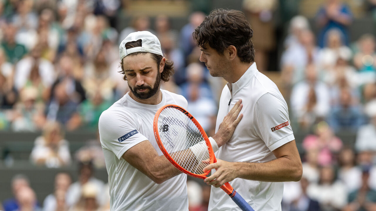 LONDON, ENGLAND - JULY 06: Taylor Fritz of the United States consoles his opponent Jordan Thompson of Australia who retired injured in their fourth round match of the Gentlemen's Singles Competition on Court No. 1 during the Wimbledon Lawn Tennis Championships at the All England Lawn Tennis and Croquet Club at Wimbledon on July 6th, 2025, in London, England.