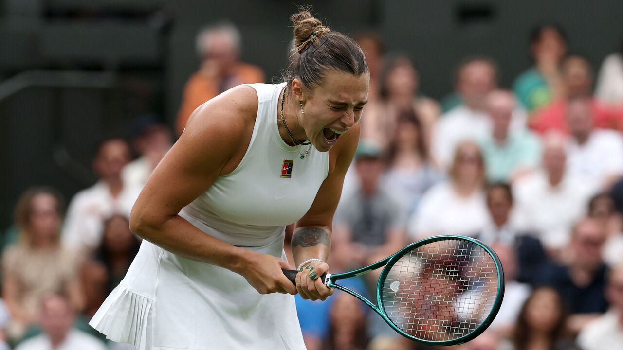 LONDON, ENGLAND - JULY 06: Aryna Sabalenka celebrates a point against Elise Mertens of Belgium during the Ladies' Singles fourth round match on day seven of The Championships Wimbledon 2025 at All England Lawn Tennis and Croquet Club on July 06, 2025 in London, England.