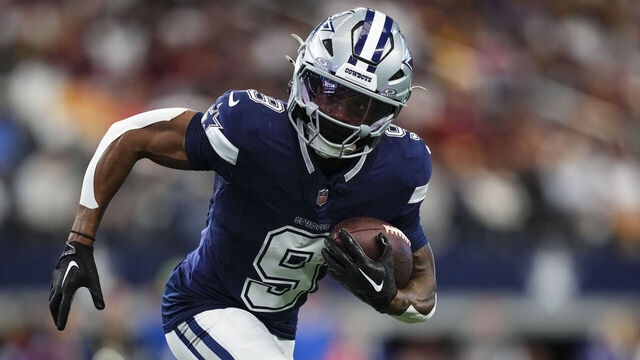ARLINGTON, TX - JANUARY 05: KaVontae Turpin #9 of the Dallas Cowboys runs the ball during an NFL football game against the Washington Commanders at AT&T Stadium on January 5, 2025 in Arlington, Texas.