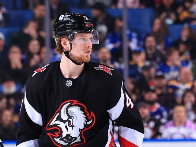 BUFFALO, NEW YORK - APRIL 5: Bowen Byram #4 of the Buffalo Sabres prepares for a faceoff against the Tampa Bay Lightning during an NHL game on April 5, 2025 at KeyBank Center in Buffalo, New York.