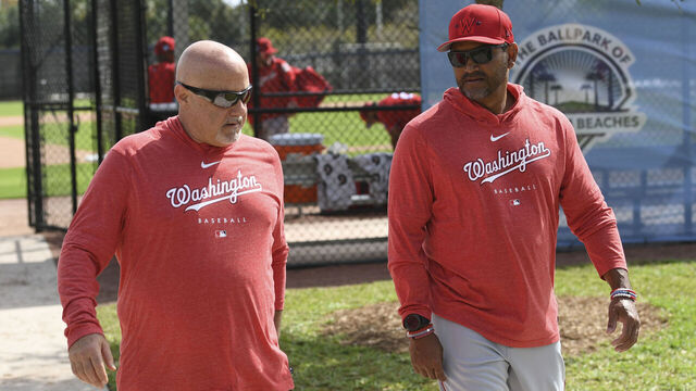 WEST PALM BEACH, FL - FEBRUARY 18: Washington Nationals president and general manager Mike Rizzo walks with manager Dave Martinez (4) during spring training workouts at the training complex on February 18, 2023.