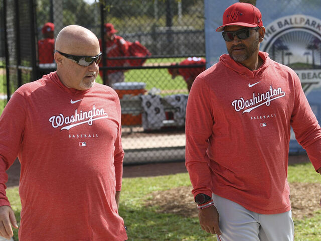 WEST PALM BEACH, FL - FEBRUARY 18: Washington Nationals president and general manager Mike Rizzo walks with manager Dave Martinez (4) during spring training workouts at the training complex on February 18, 2023.