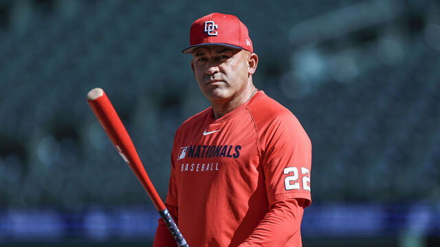 SEATTLE, WASHINGTON - MAY 27: Bench Coach Miguel Cairo #22 of the Washington Nationals looks on during batting practice before the start of a game against the Seattle Mariners at T-Mobile Park on May 27, 2025 in Seattle, Washington.