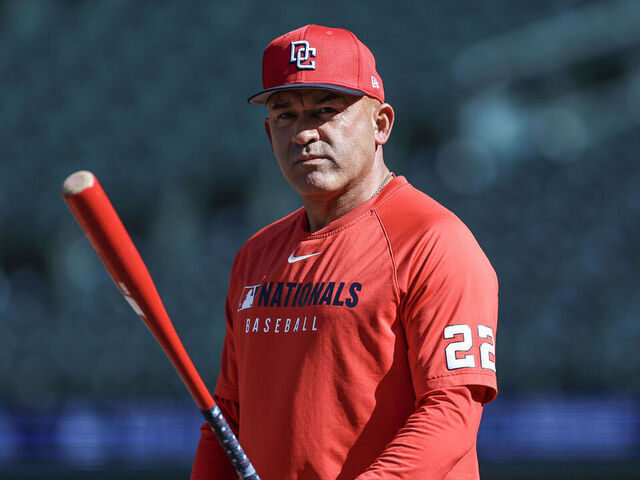 SEATTLE, WASHINGTON - MAY 27: Bench Coach Miguel Cairo #22 of the Washington Nationals looks on during batting practice before the start of a game against the Seattle Mariners at T-Mobile Park on May 27, 2025 in Seattle, Washington.