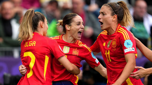 THUN, SWITZERLAND - JULY 07: Esther Gonzalez of Spain celebrates with teammates Olga Carmona and Alexia Putellas after scoring her team's third goal during the UEFA Women's EURO 2025 Group B match between Spain and Belgium at Arena Thun on July 07, 2025 in Thun, Switzerland.