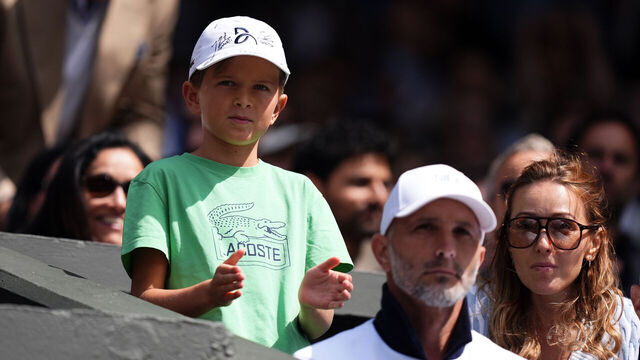 Jelena Djokovic with son Stefan (left) watching Stefan take on Alex De Minaur on centre court, on day eight of the 2025 Wimbledon Championships at the All England Lawn Tennis and Croquet Club, London. Picture date: Monday July 7, 2025.