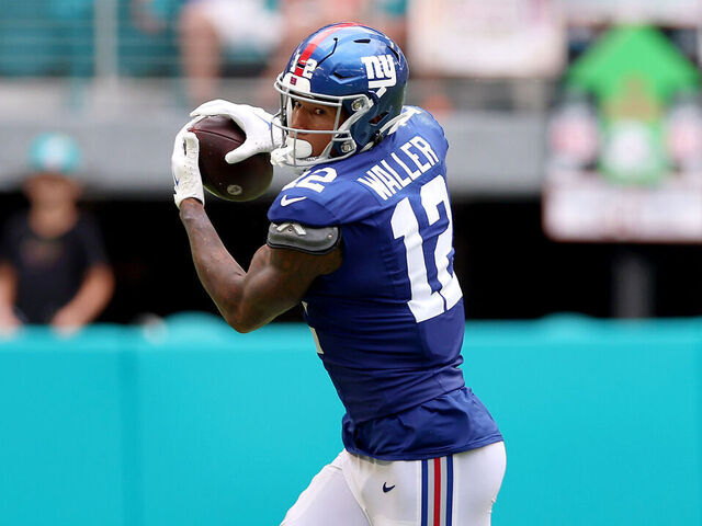MIAMI GARDENS, FLORIDA - OCTOBER 08: Darren Waller #12 of the New York Giants makes a catch against the Miami Dolphins during the second half at Hard Rock Stadium on October 08, 2023 in Miami Gardens, Florida.